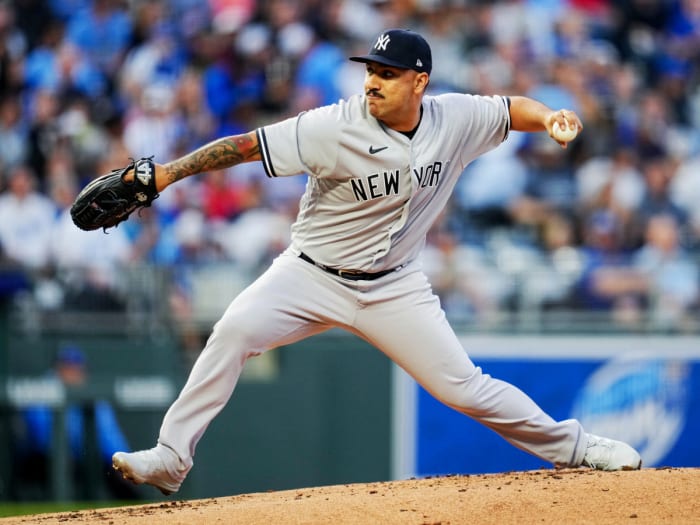 Apr 29, 2022; Kansas City, Missouri, USA; New York Yankees starting pitcher Nestor Cortes (65) throws against the Kansas City Royals during the first inning at Kauffman Stadium.